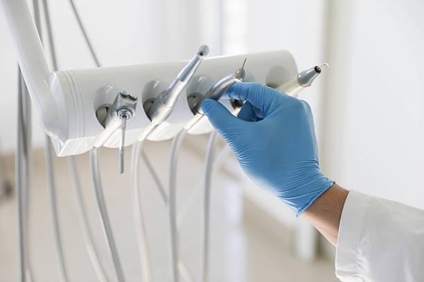 Professional Invisalign Clear Aligners technician working in Cutchogue, NY